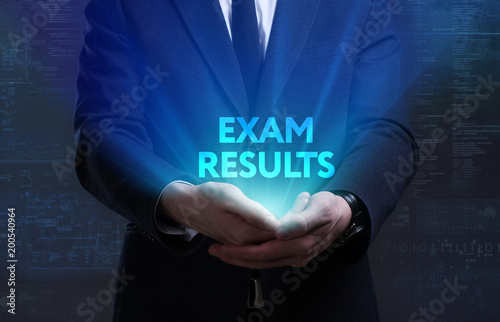 Business, Technology, Internet and network concept. Young businessman working on a virtual screen of the future and sees the inscription: Exam results