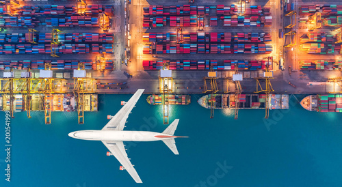 Stampa su tela Container ships and transport aircraft in the export and import business and logistics international goods