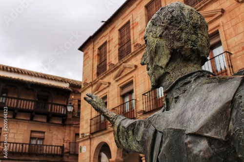 Villanueva de los Infantes square and Don Quixote statue in the foreground