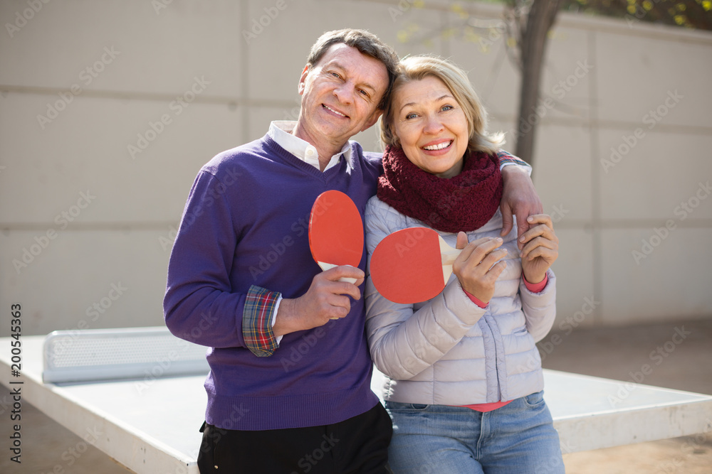 © caftor - portrait mature man and a woman playing table tennis © caftor - portrait mature man and a woman playing table tennis