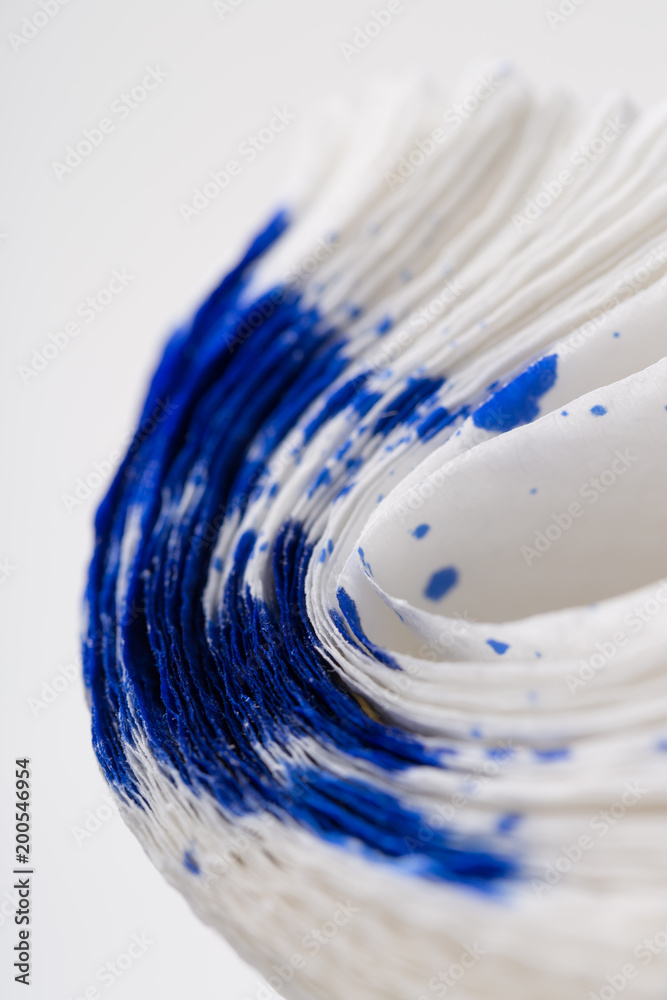 Closeup of blue ink spill on paper napkins. Closeup of blue ink spill on paper napkins.