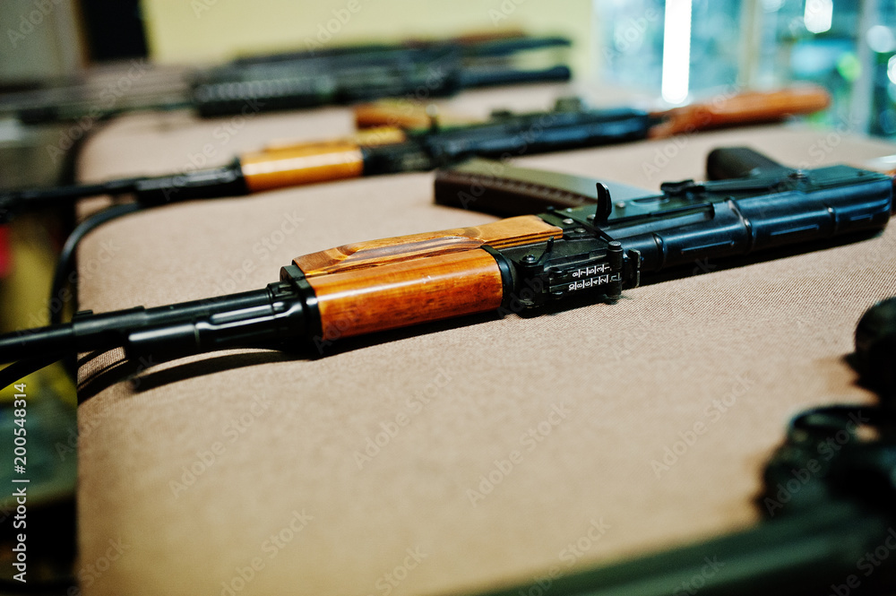 Naklejka premium Close up machine guns on shooting range.