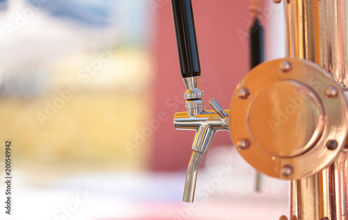 Bronze draft or draught beer dispenser with tap for selling alcohol