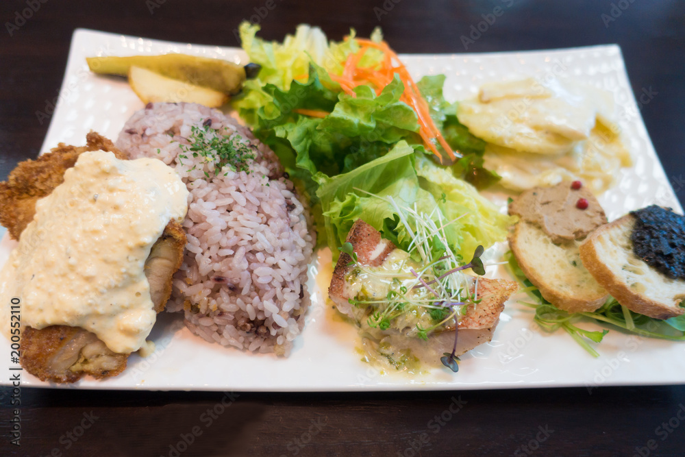 Set lunch with multi grain rice and varieties of dishes. Set lunch with multi grain rice and varieties of dishes.