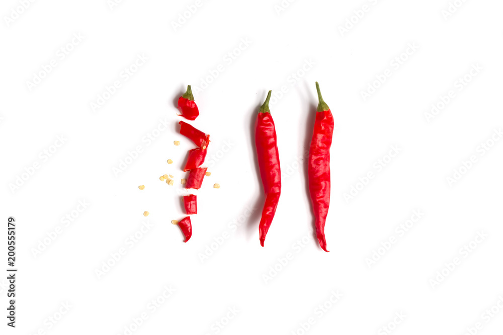top view of chili sliced and cut and artful arranged on white background top view of chili sliced and cut and artful arranged on white background