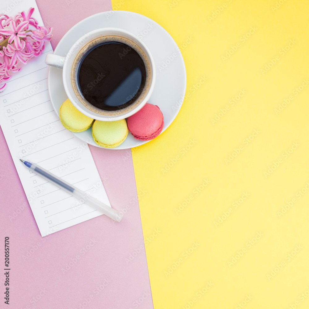 Creative flat lay with coffee cup and macaroons Creative flat lay with coffee cup and macaroons