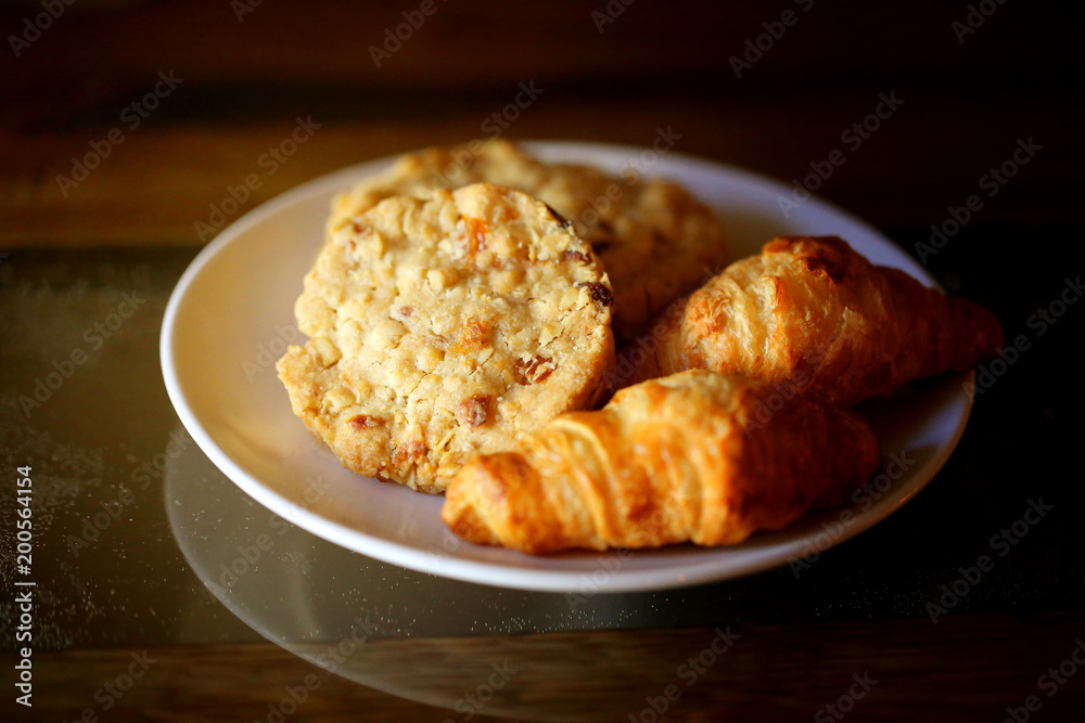 Photo of macro delicious croissants and cookies Photo of macro delicious croissants and cookies