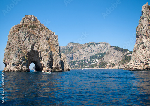 View from the boat on the Faraglioni Rocks on Capri Island, Italy. photo