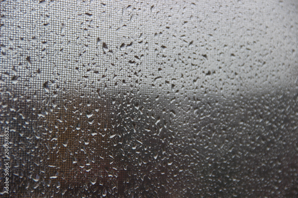 Background, texture – drops of rain water on the misted glass window cloudy autumn Background, texture – drops of rain water on the misted glass window cloudy autumn