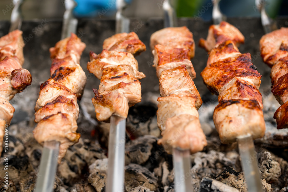 Barbecue on open air. Preparation of meat on the grill. Barbecue on open air. Preparation of meat on the grill.