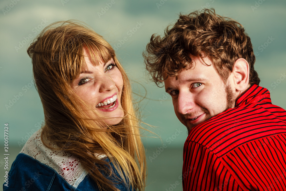 Closeop couple relaxing on sea shore
