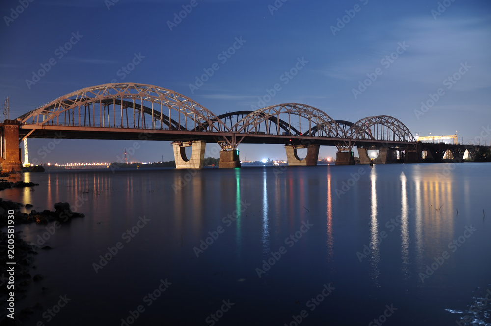 Bridge over river. Night landscape.