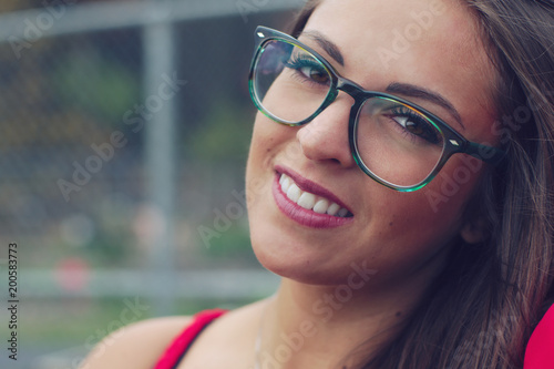 young beautiful women closeup eyeglasses red dress elegant style attractive girl beauty lady