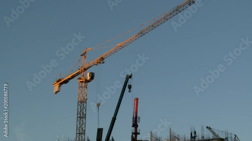 Crane working at a construction site photo