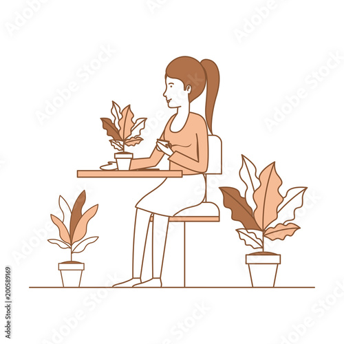 woman drink coffee in the garden