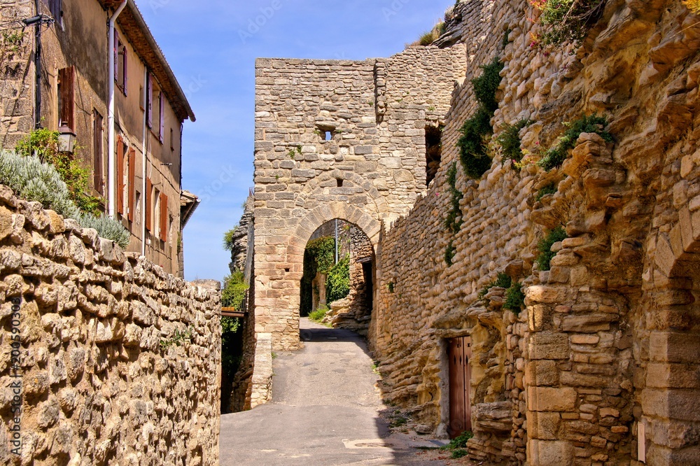 Ancient gate in the medieval walls of Saignon, Provence, France