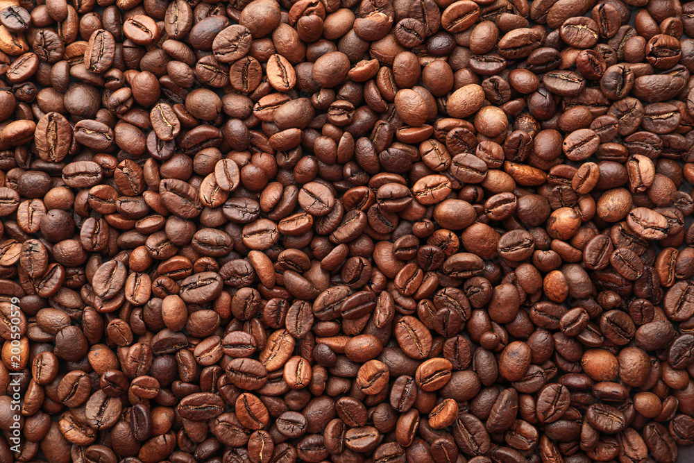 Fototapeta premium Coffee beans as background, top view