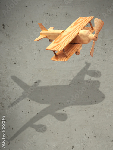 The flight wood airplane with the shadow plane photo
