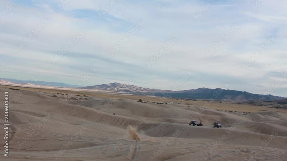 Sand dune jump on dirt bike. Sand dune jump on dirt bike.
