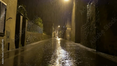 Biella, Italy - April 11, 2018 - Strong night rain in the main street of the country, Tavigliano 