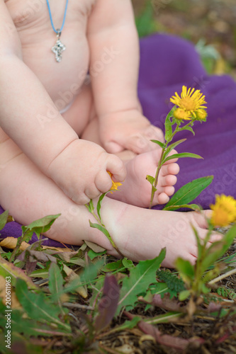 Baby feet and flowers