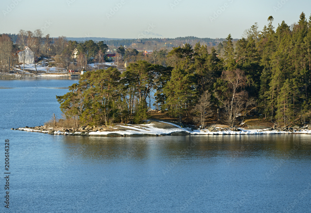 Stockholm archipelago island, largest archipelago in Sweden, and second-largest archipelago in Baltic Sea. Spring sunny landscape Stockholm archipelago island, largest archipelago in Sweden, and second-largest archipelago in Baltic Sea. Spring sunny landscape