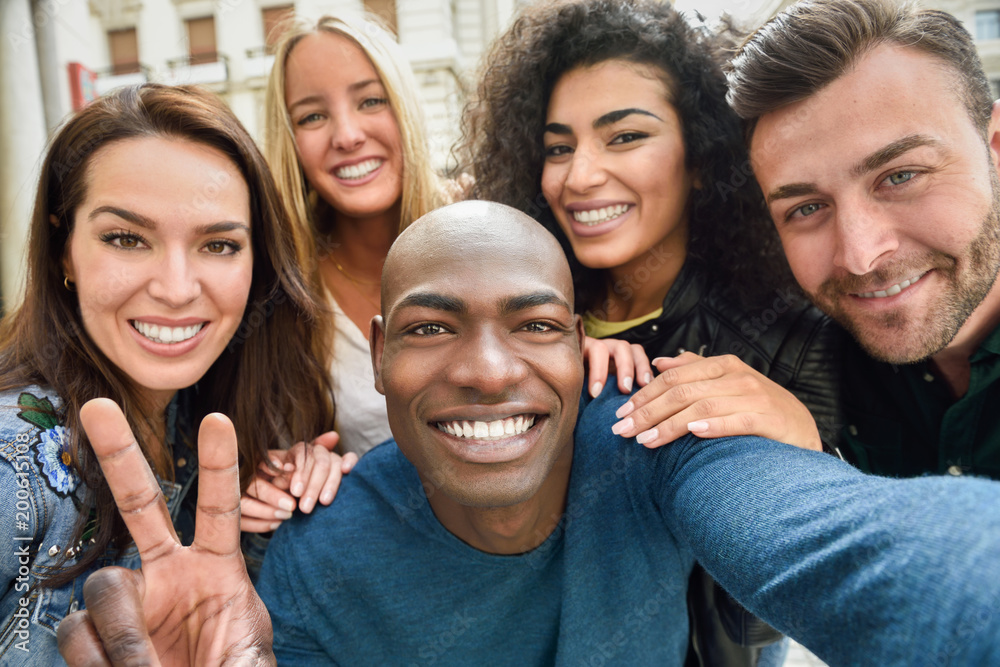 Multiracial group of young people taking selfie - obrazy, fototapety, plakaty 