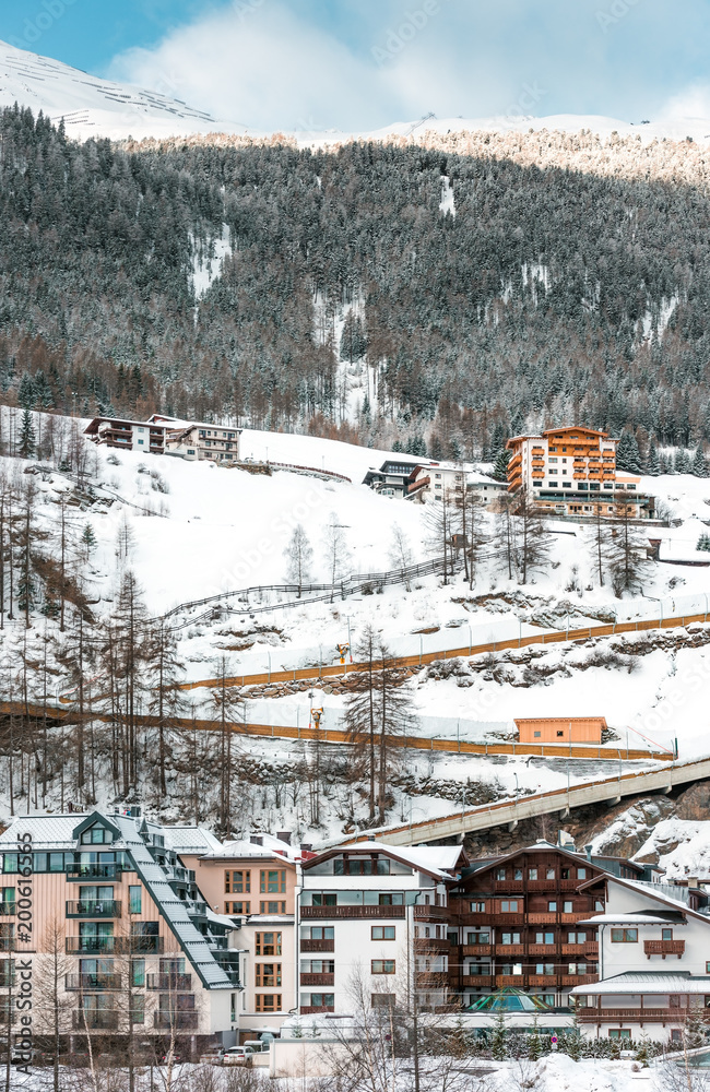 Fototapeta premium The building of hotels and chalets in the ski Alpine resort
