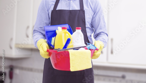 man with cleaning and disinfection products