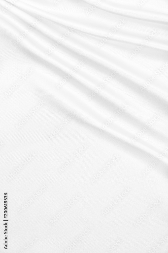 Smooth elegant white silk or satin luxury cloth texture as wedding background. Luxurious Christmas background or New Year background design Smooth elegant white silk or satin luxury cloth texture as wedding background. Luxurious Christmas background or New Year background design