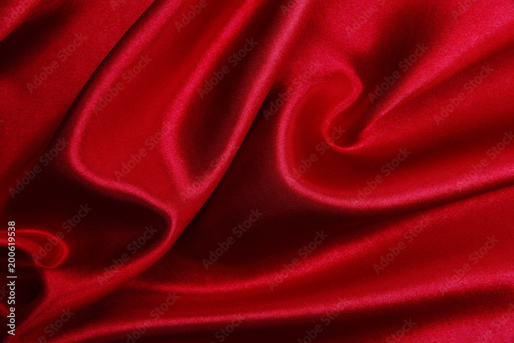 Fototapeta premium Smooth elegant red silk or satin luxury cloth texture as abstract background. Luxurious valentines day background design