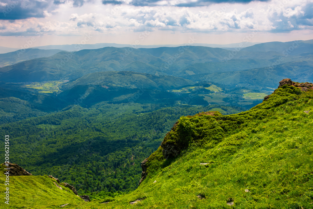 Naklejka premium cliff over the hill in high mountains. beautiful summer landscape and travel concept