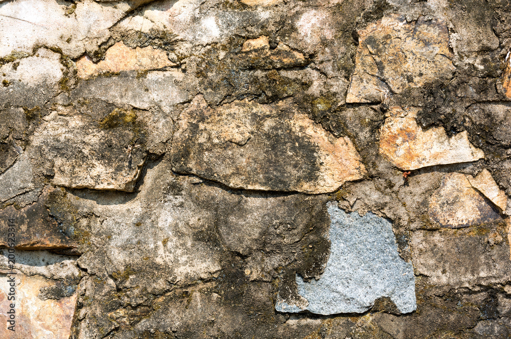 Fototapeta premium Texture. Cracked and weathered natural stone background.