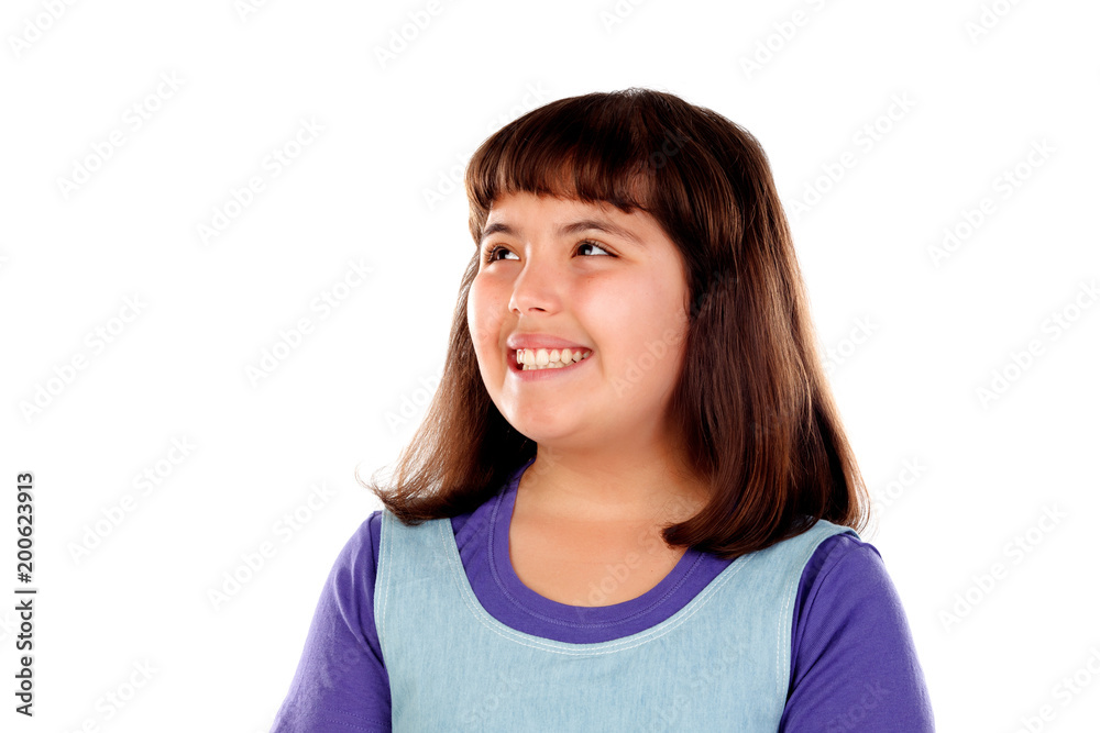 Pensive small girl imagining something Pensive small girl imagining something