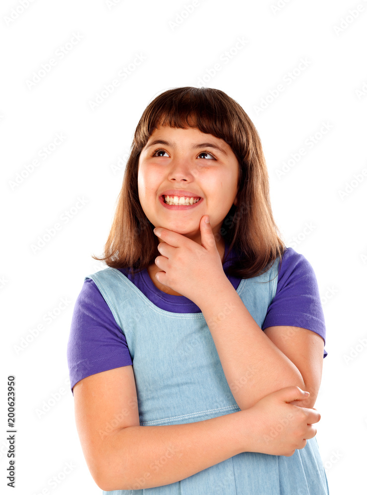 Pensive small girl imagining something Pensive small girl imagining something