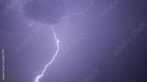 Flash of lightning in the night sky