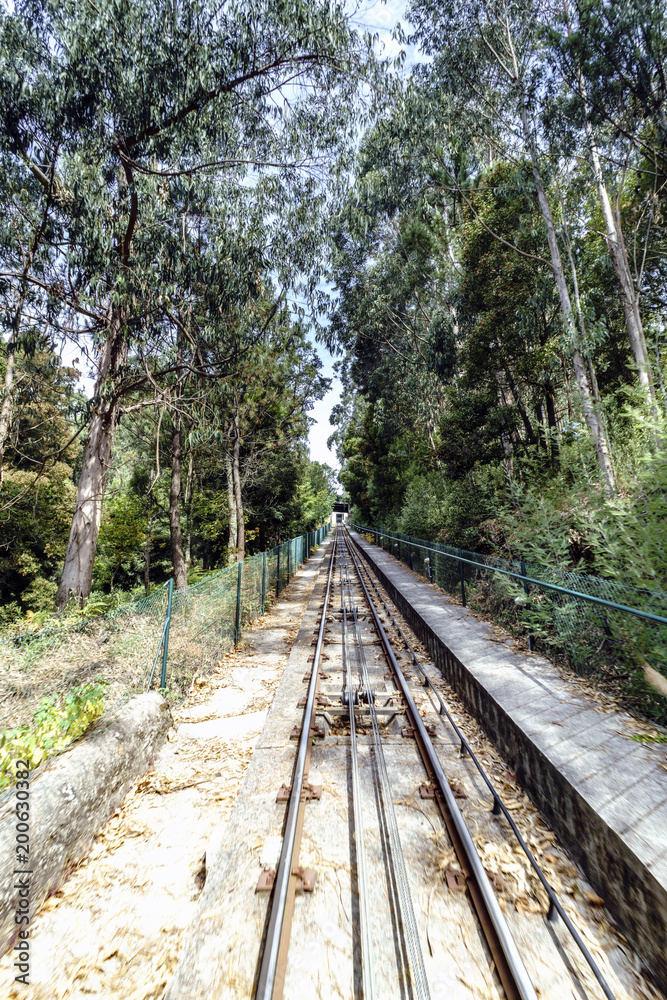 View of the roads of the Santa Lucia funicular in the upward direction. The funicular is the longest in Portugal and climbs a vertical drop of 160 meters. Located in Viana do Castelo (Portugal).
