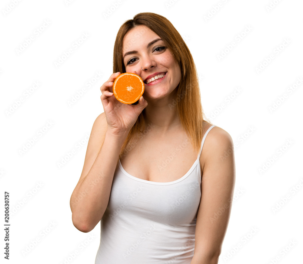 Beautiful young girl holding an orange juice Beautiful young girl holding an orange juice