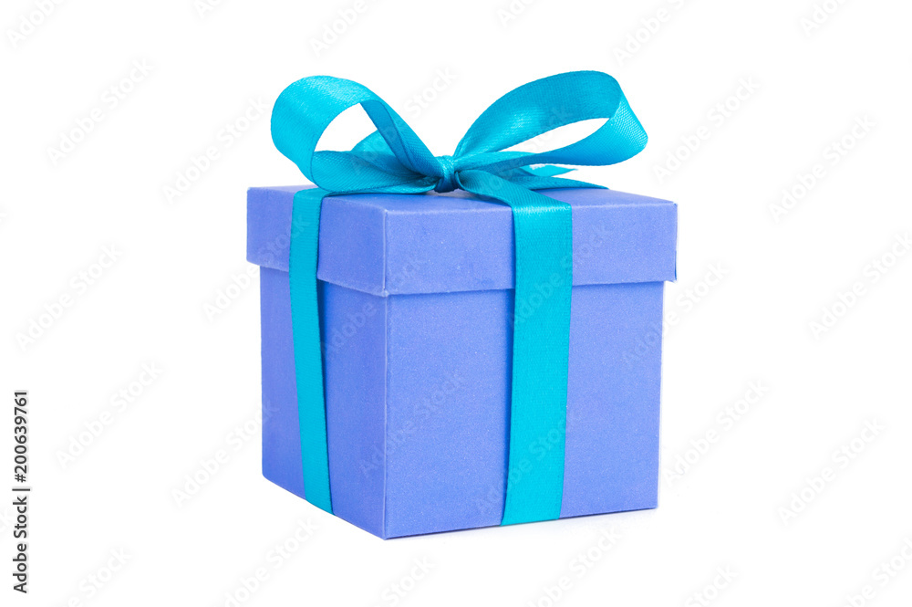 Obraz premium A blue gift box with blue ribbon isolated on white background the image for christmas and new year's day