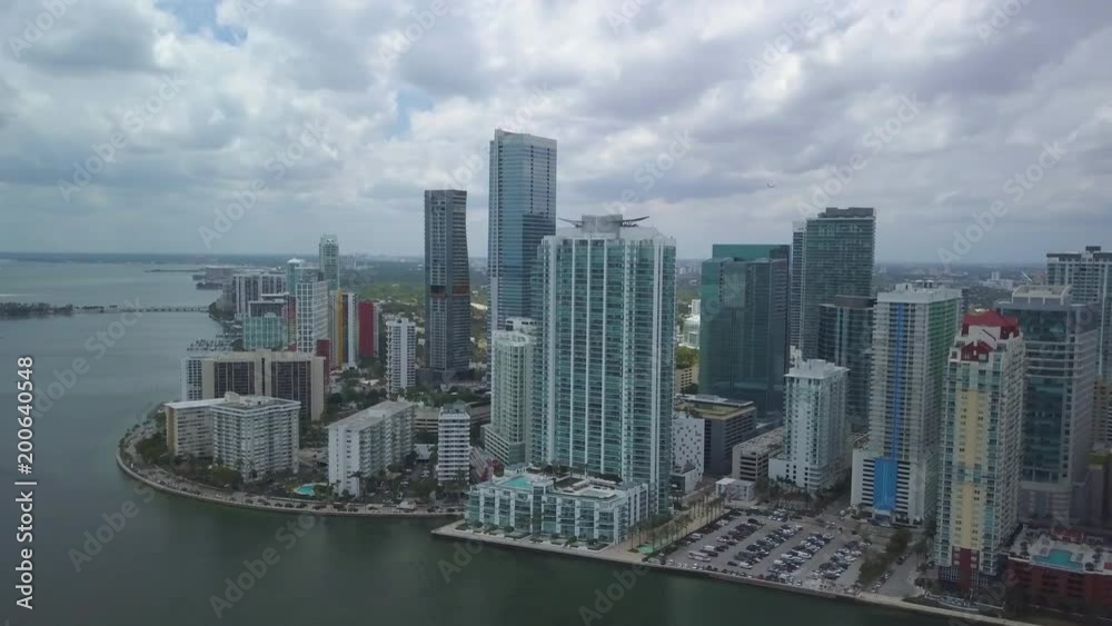 overcast day flying towards tip of downtown Miami waterfront overcast day flying towards tip of downtown Miami waterfront