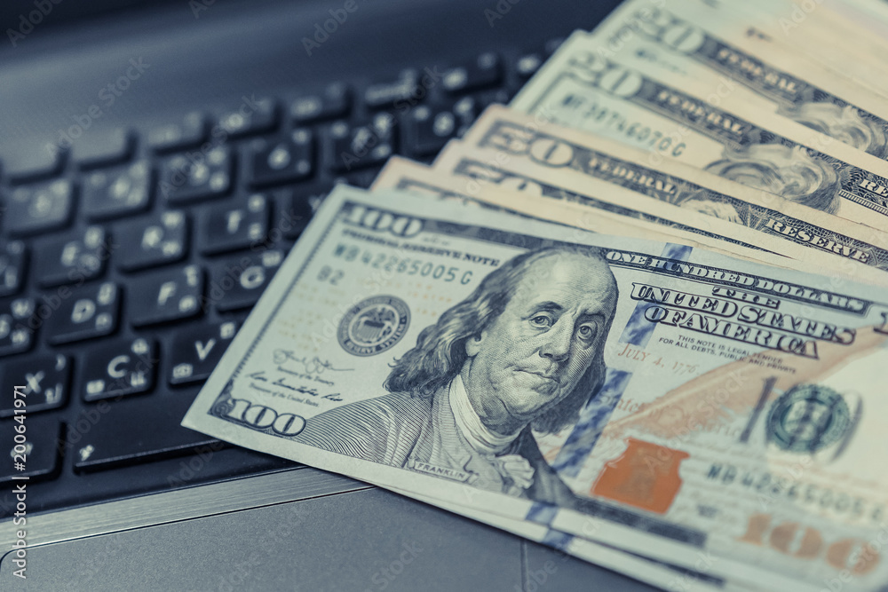 Dollar currency, American Dollars Cash Money with Keybord Computer, Business Success concept. Dollar currency, American Dollars Cash Money with Keybord Computer, Business Success concept.