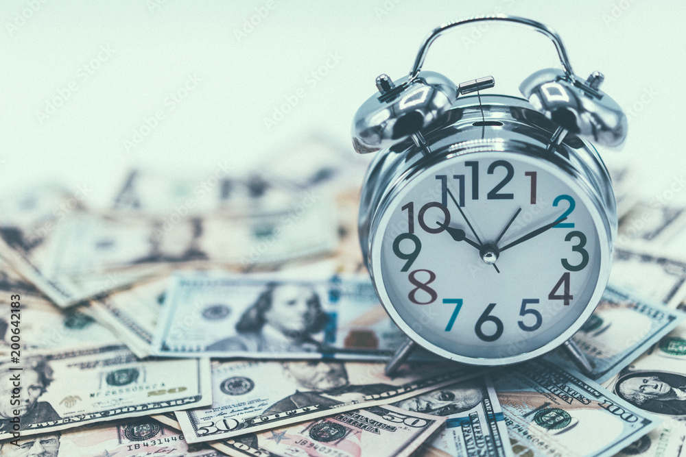 Dollar currency, American Dollars Cash Money with Alarm Clock. Dollar currency, American Dollars Cash Money with Alarm Clock.