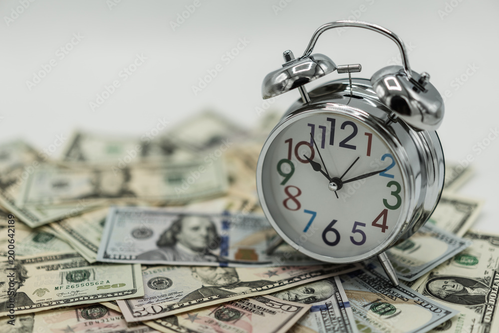 Dollar currency, American Dollars Cash Money with Alarm Clock. Dollar currency, American Dollars Cash Money with Alarm Clock.