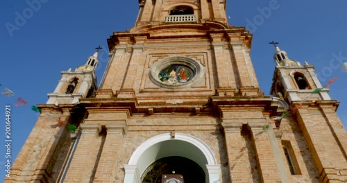 Tilt up of the church of our lady of Guadalupe Puerto Vallarta, Mexico photo