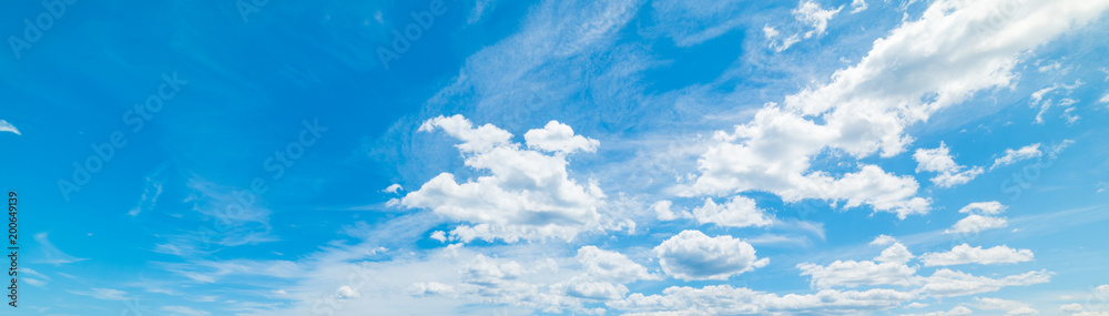 Fototapeta premium Blue sky with soft clouds in spring