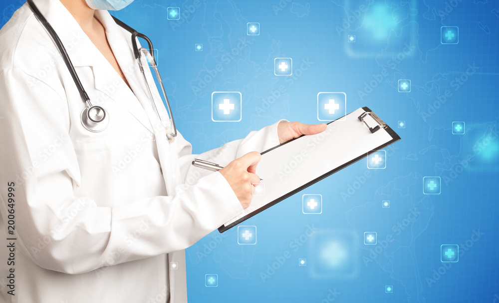 Female doctor holding notepad with blue background and crosses Female doctor holding notepad with blue background and crosses
