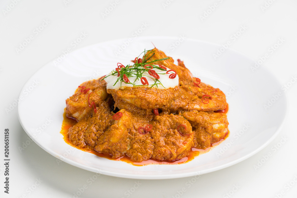 Curry-fried shrimps isolated on a white background. Thai food. Copy space. For design. Thai food concept. Curry-fried shrimps isolated on a white background. Thai food. Copy space. For design. Thai food concept.