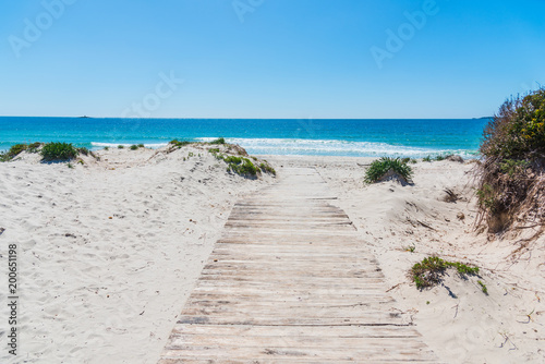 Wooden boardwalk in Maria Pia beach