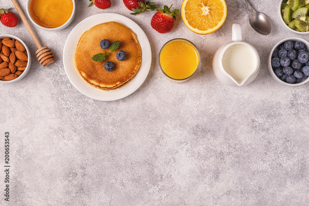 Pancakes with fruit, honey, nuts. Pancakes with fruit, honey, nuts.