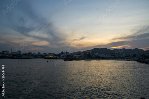 blue sea and clouds on sky with water surface and sunlight reflections